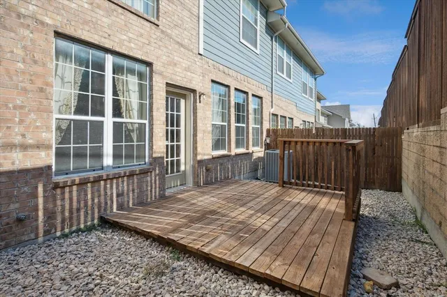 a view of backyard with deck