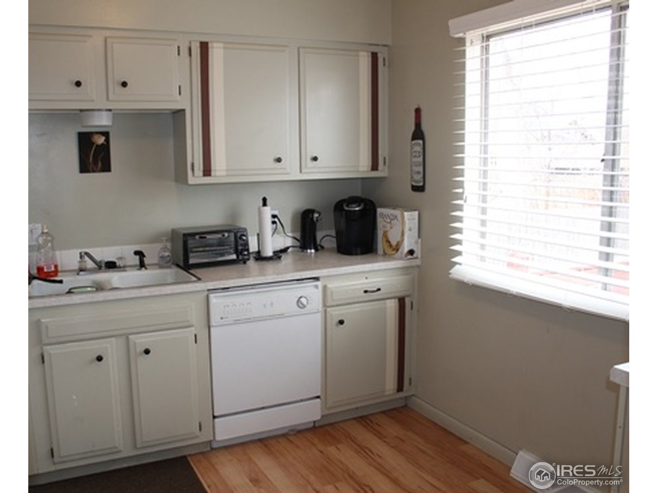 417 Briarwood Road Fort Collins, CO 80521 - Photo 5 of 20 Cute kitchen with painted cabinets