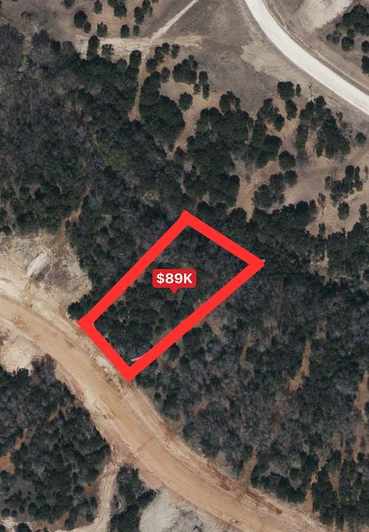 1024 Rose Court Nemo, TX 76070 - Photo 4 of 11 a large body of water with a building in the background