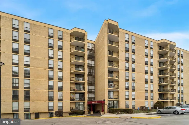 a view of a swimming pool and lounge chairs