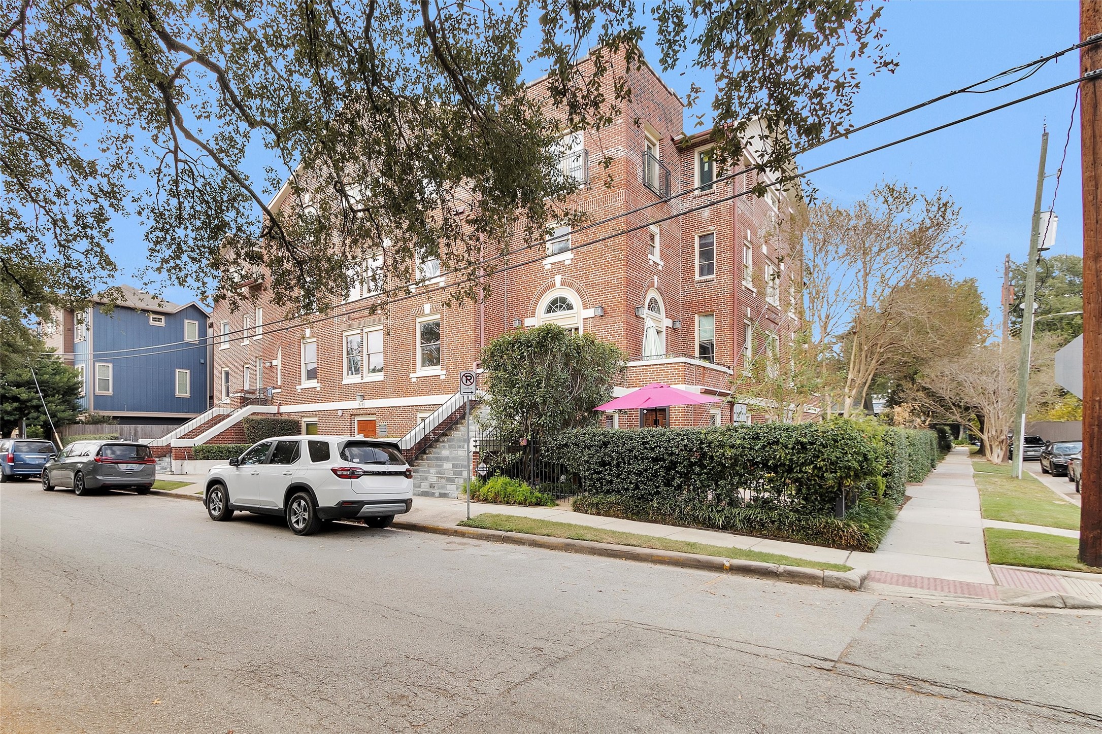 215 West Norma Street, Unit 104 Houston, TX 77009 - Photo 6 of 37 a view of a cars parked in front of a building
