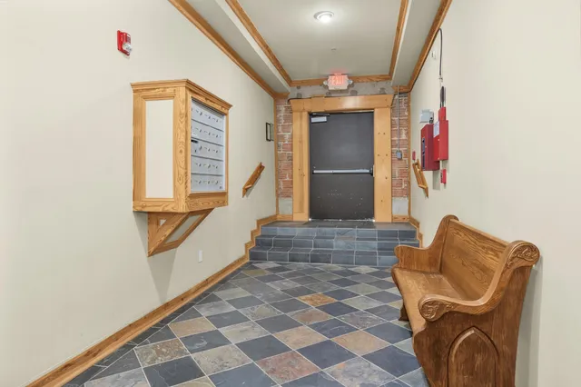 a view of hallway with washer and dryer