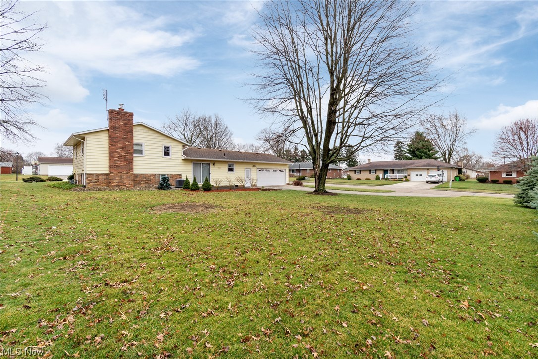 41 Willard Street Rittman, OH 44270 - Photo 24 of 25 View of yard with a garage
