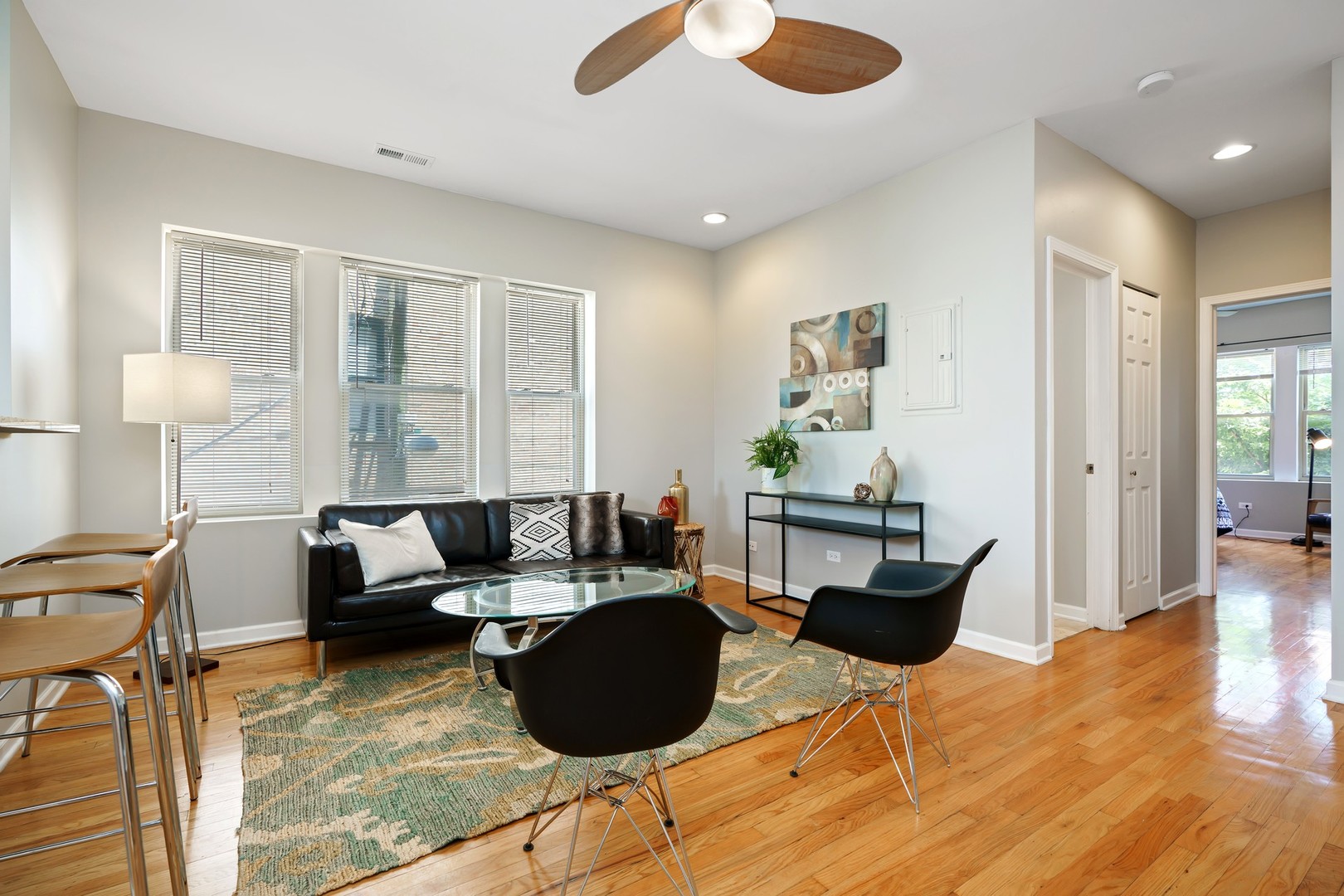 4344 North Spaulding Avenue, Unit 2 Chicago, IL 60618 - Photo 2 of 15 a living room with furniture and a window
