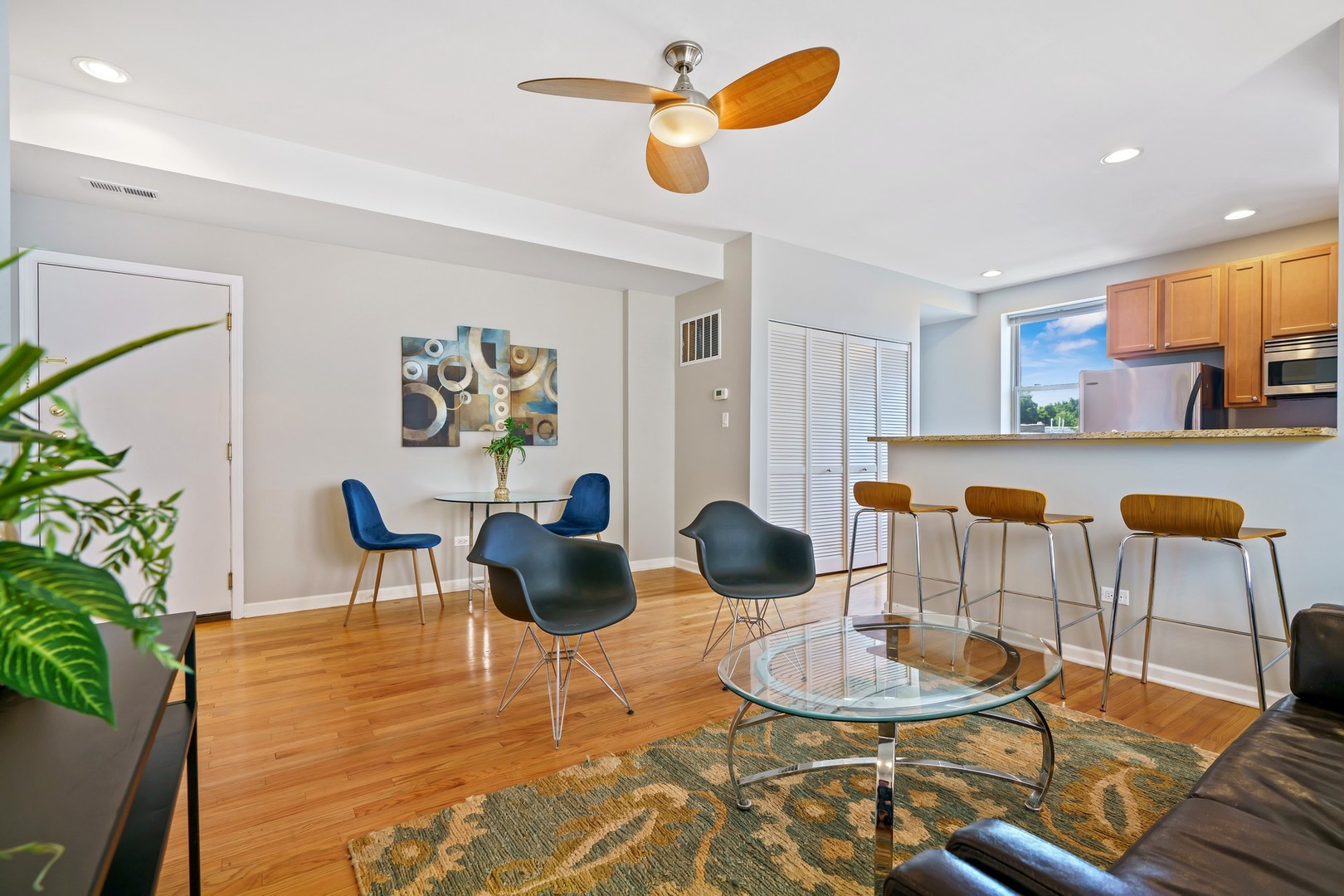4344 North Spaulding Avenue, Unit 2 Chicago, IL 60618 - Photo 3 of 15 a living room with furniture and a table