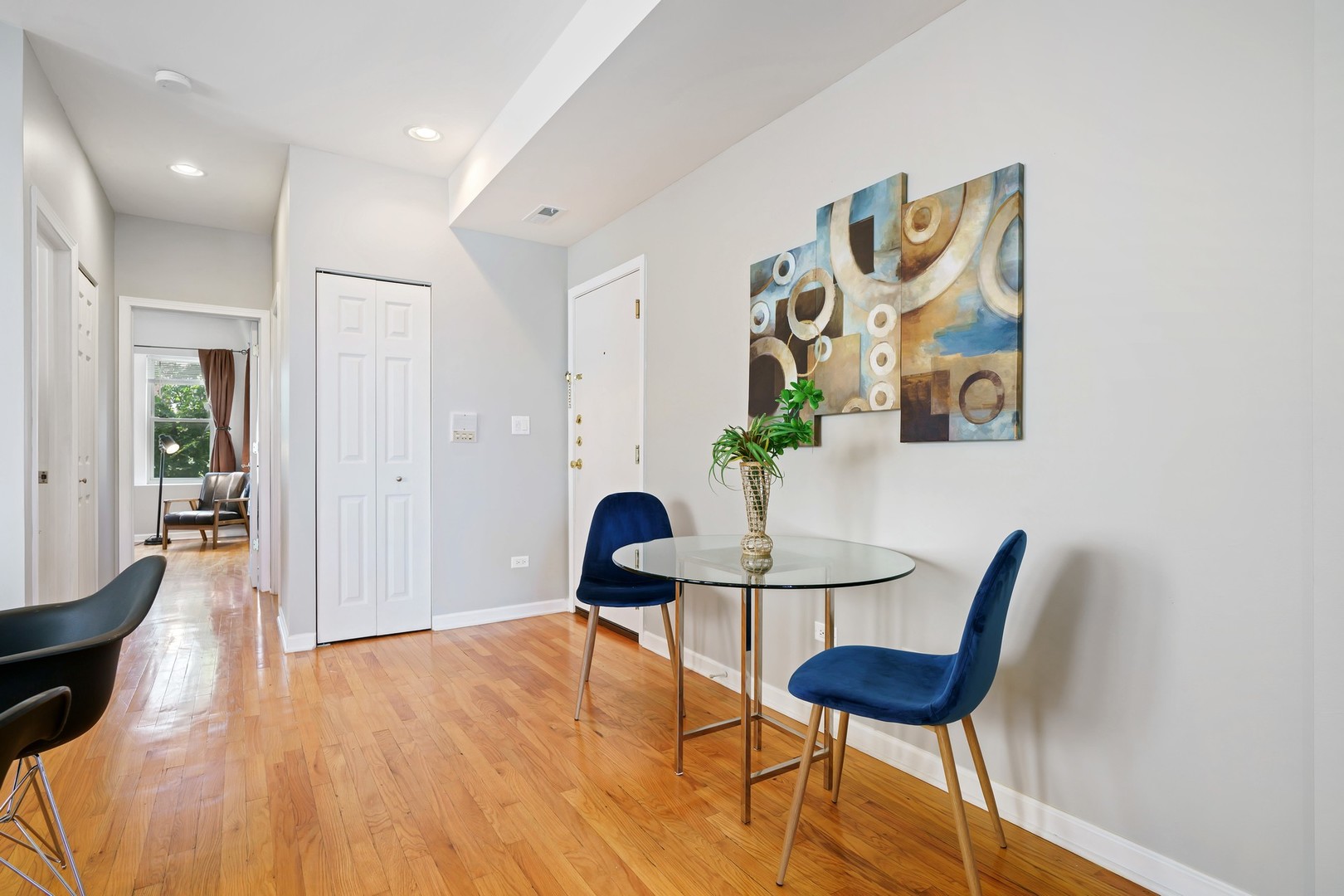4344 North Spaulding Avenue, Unit 2 Chicago, IL 60618 - Photo 9 of 15 a view of a room with furniture and wooden floor