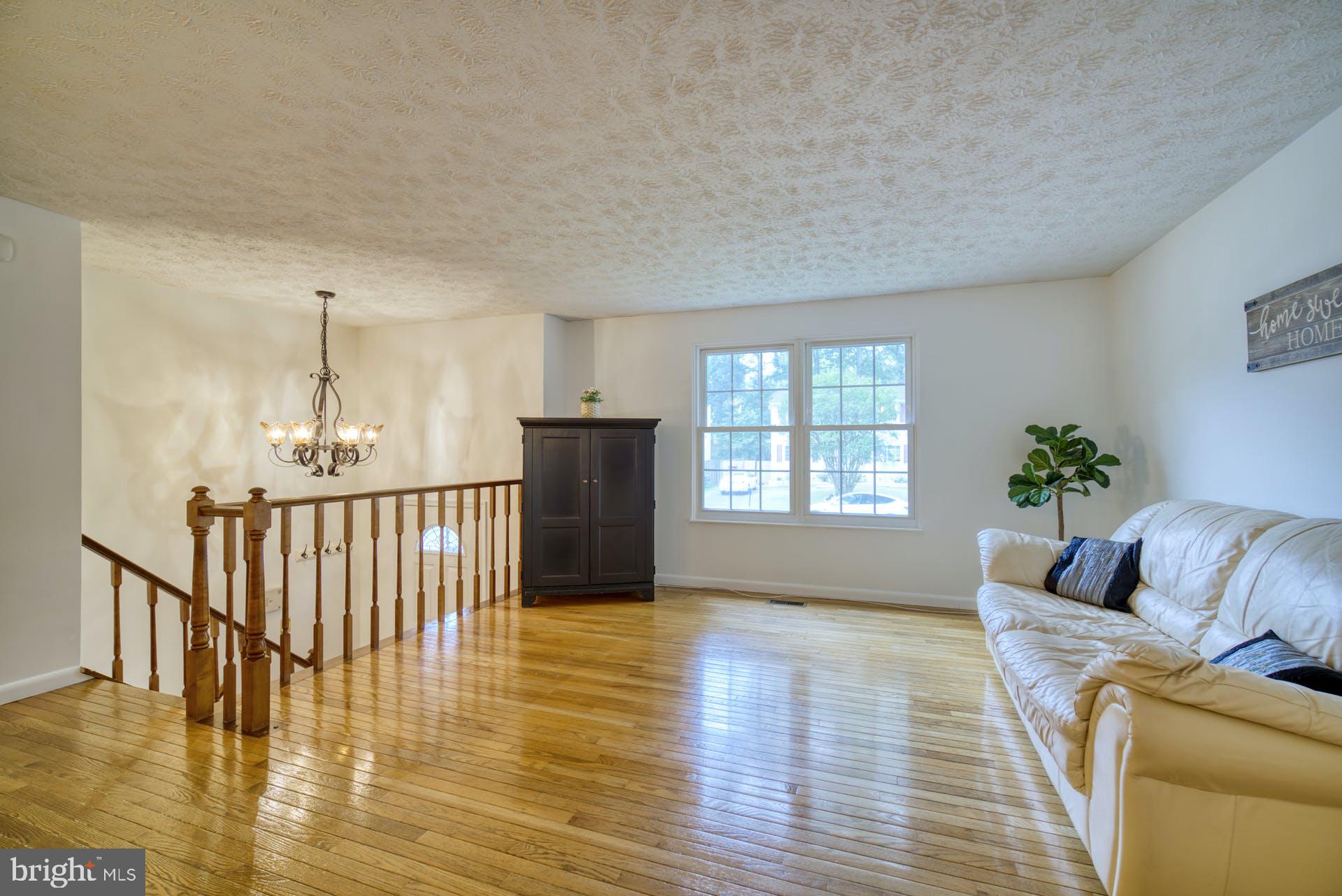 8286 Raindrop Way Springfield, VA 22153 - Photo 7 of 40 Another view of Living Room from Dining Area