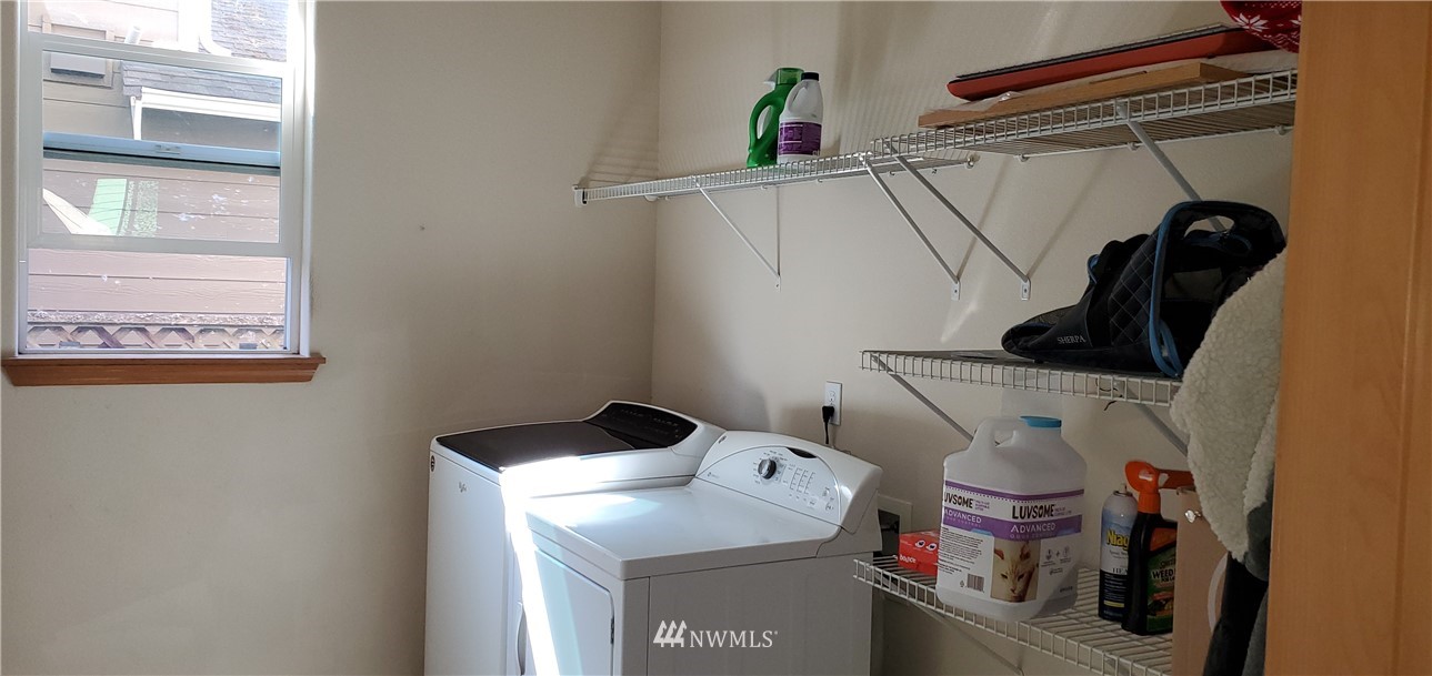 7365 Radius Loop Southeast Lacey, WA 98513 - Photo 13 of 28 a utility room with dryer and washer