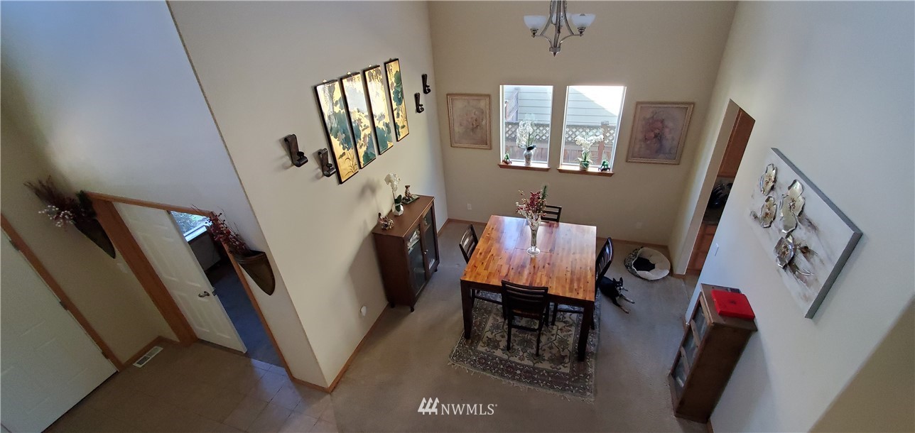 7365 Radius Loop Southeast Lacey, WA 98513 - Photo 5 of 28 a view of a livingroom with furniture and windows