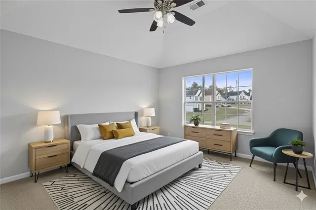 a bedroom with bed and a chandelier