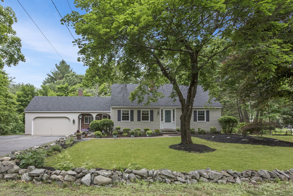 11 Forrest Road Topsfield, MA 01983 - Photo 1 of 30 a front view of a house with a yard