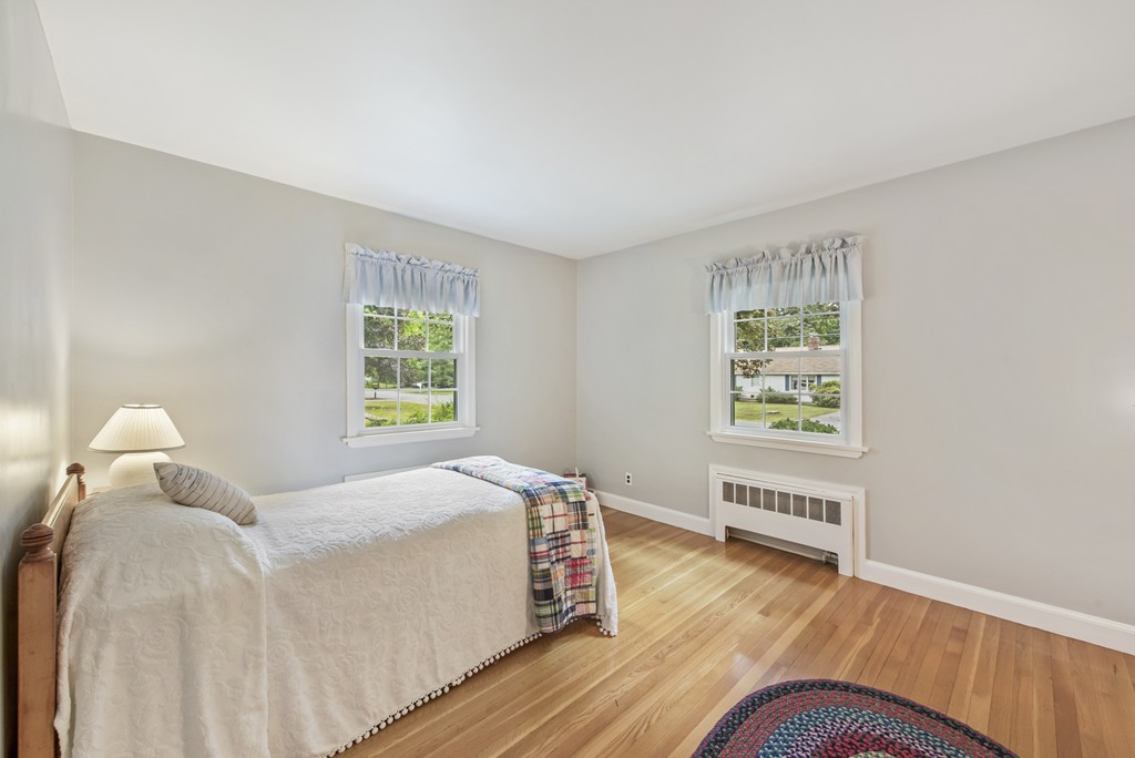 11 Forrest Road Topsfield, MA 01983 - Photo 20 of 30 a bedroom with a bed and a window
