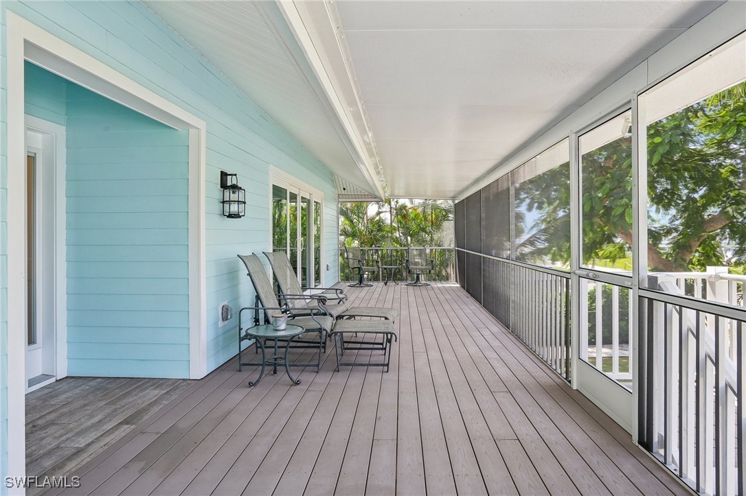 8335 Main Street Bokeelia, FL 33922 - Photo 7 of 47 a view of outdoor space with seating space