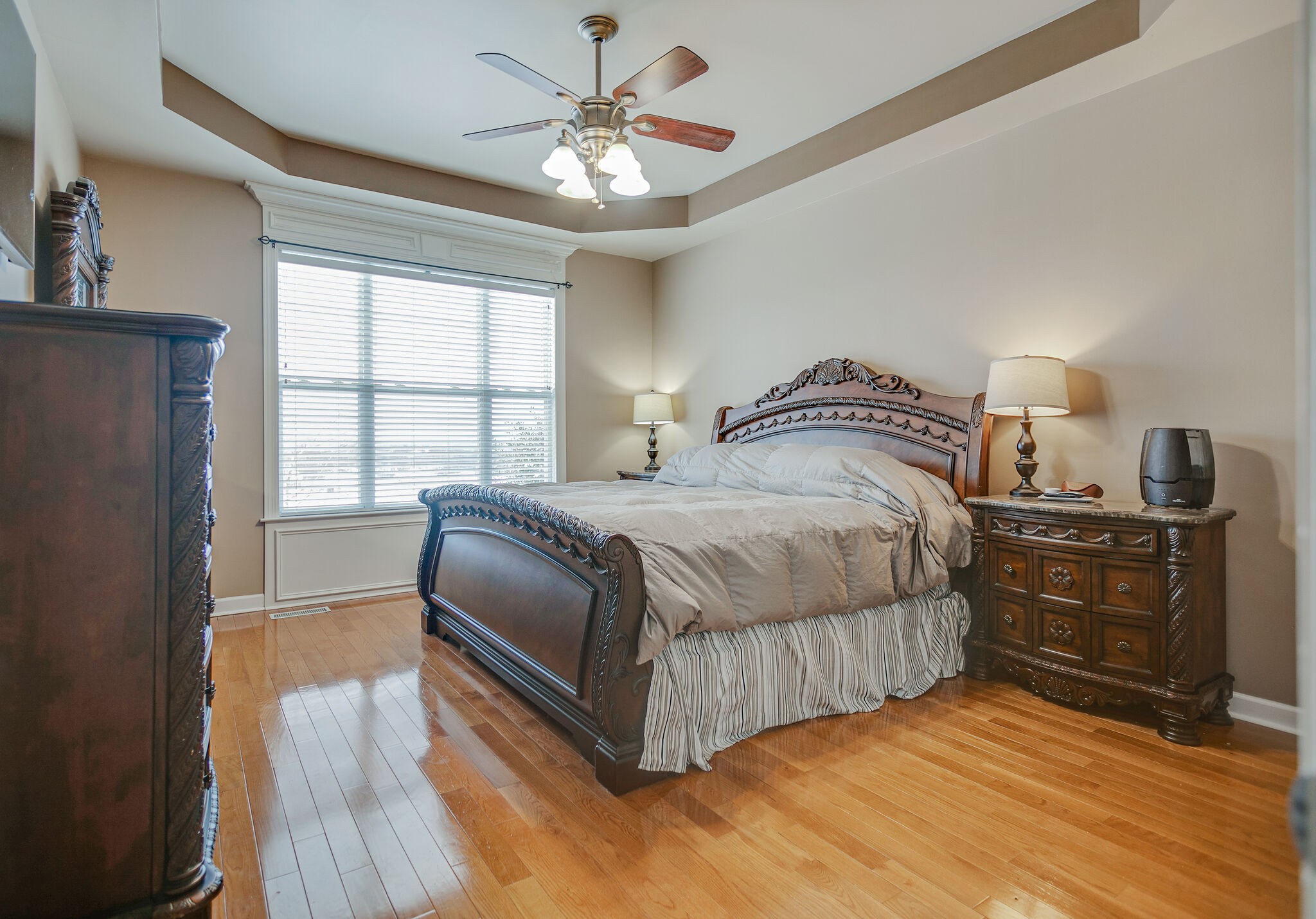 3029 Viewpointe Way Columbia, TN 38401 - Photo 16 of 40 a bedroom with a bed and wooden floor