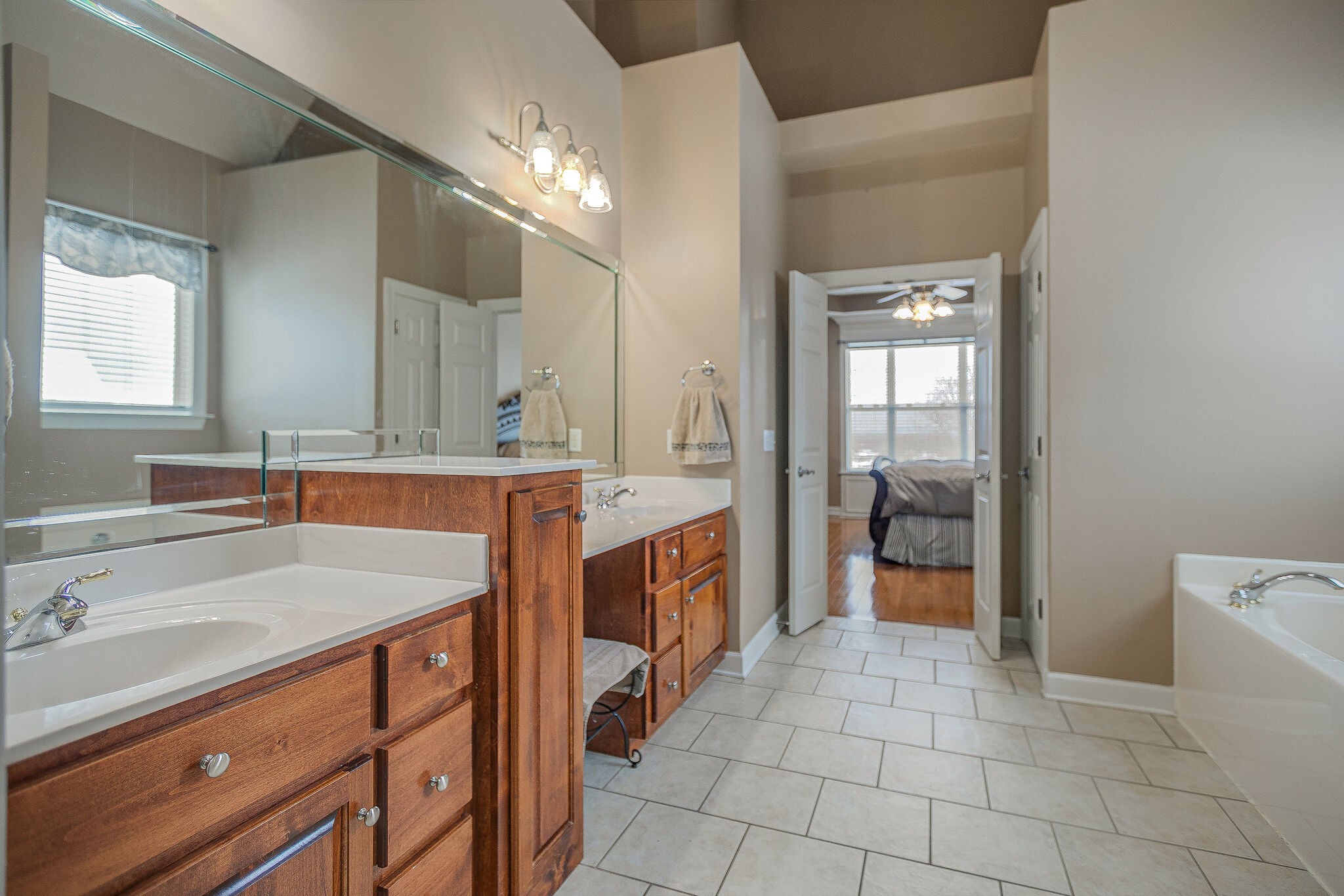 3029 Viewpointe Way Columbia, TN 38401 - Photo 18 of 40 a bathroom with a sink a vanity and a mirror