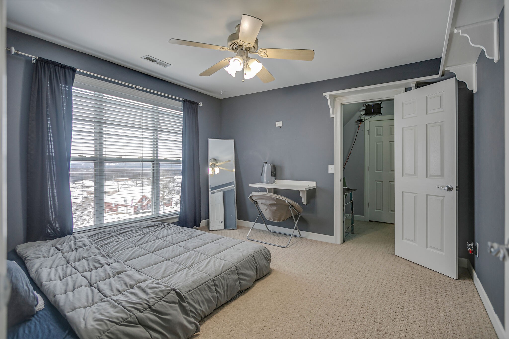 3029 Viewpointe Way Columbia, TN 38401 - Photo 20 of 40 a spacious bedroom with a bed a dresser and a large window