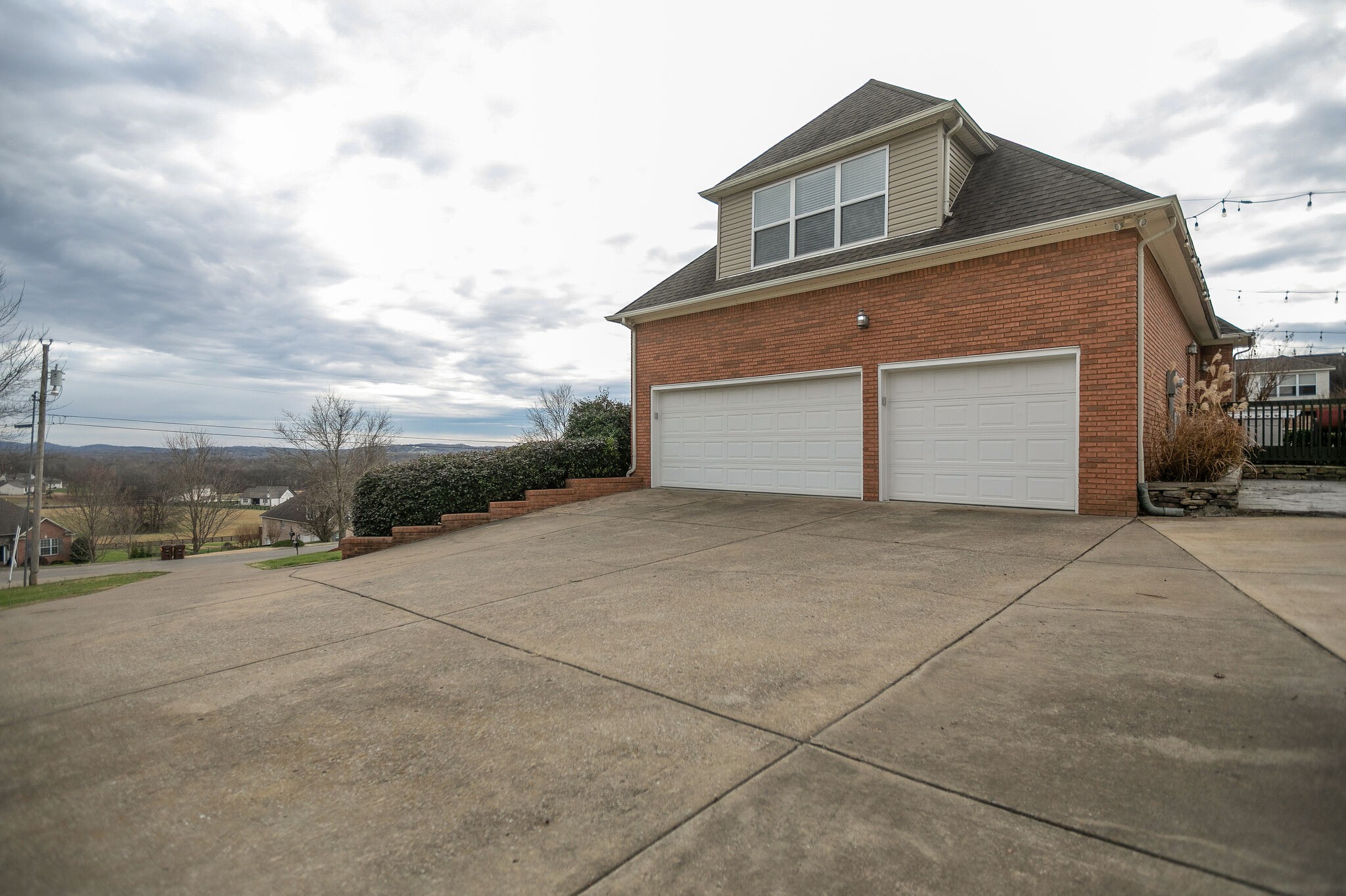 3029 Viewpointe Way Columbia, TN 38401 - Photo 40 of 40 a front view of a house with a yard and garage
