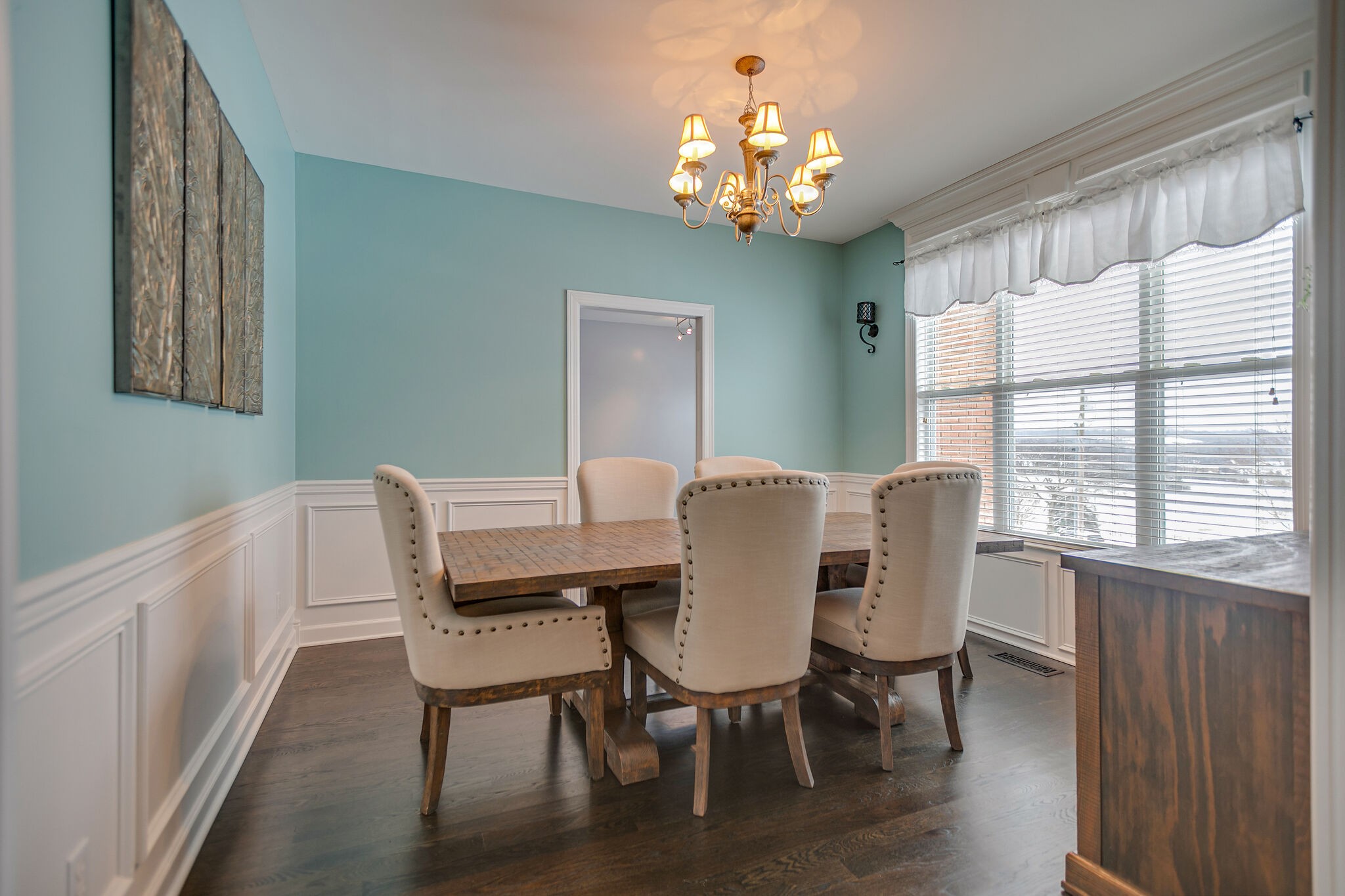 3029 Viewpointe Way Columbia, TN 38401 - Photo 7 of 40 a view of a dining room with furniture a chandelier and wooden floor