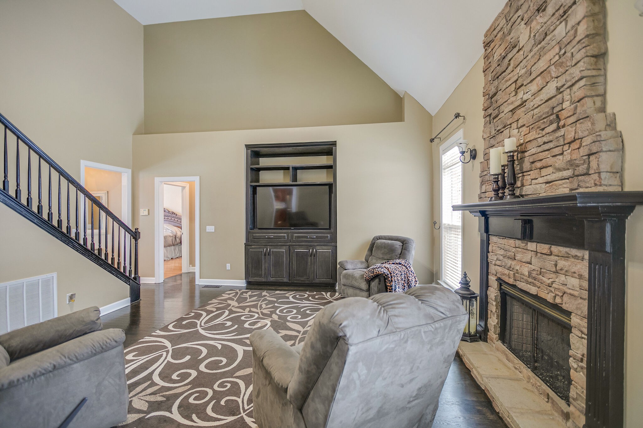 3029 Viewpointe Way Columbia, TN 38401 - Photo 10 of 40 a bedroom with a bed and a fireplace