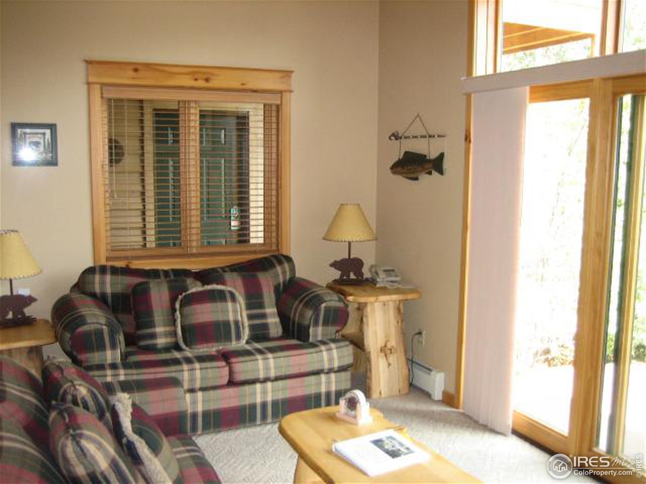 2100 Fall River Road, Unit 6 Estes Park, CO 80517 - Photo 4 of 6 a bathroom with a sink and a mirror