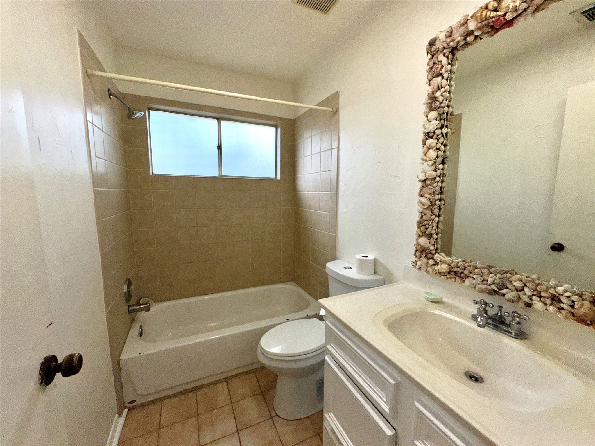 8511 Little River Road Houston, TX 77064 - Photo 14 of 19 a bathroom with a sink a toilet and shower