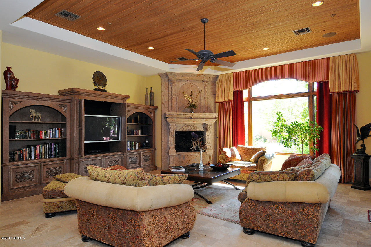 6901 East Sunnyvale Road Paradise Valley, AZ 85253 - Photo 17 of 45 Hand carved Cantera Fireplace, Built-ins