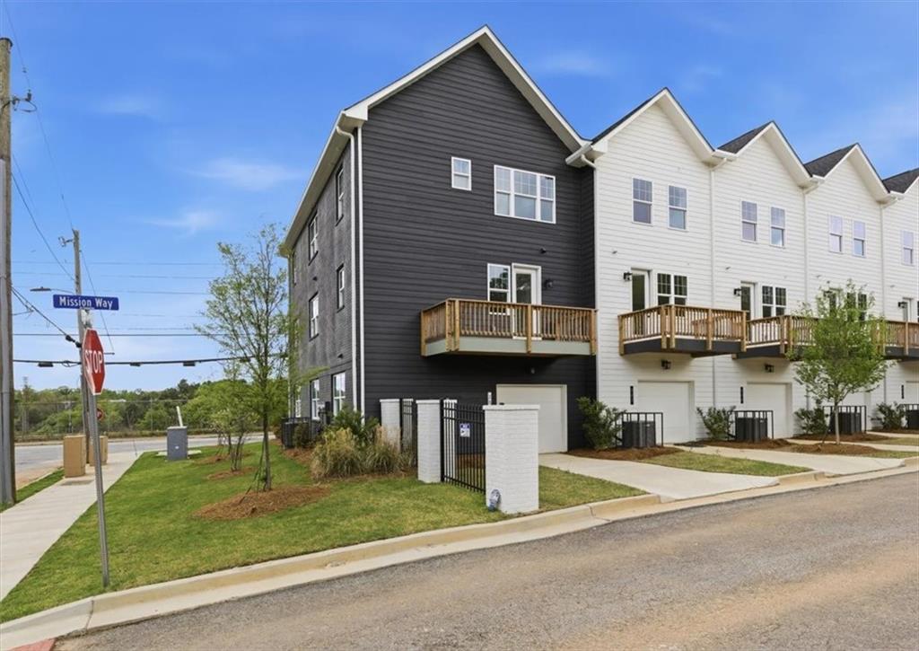 208 Mission Way Atlanta, GA 30315 - Photo 19 of 43 a view of a house with a yard and plants