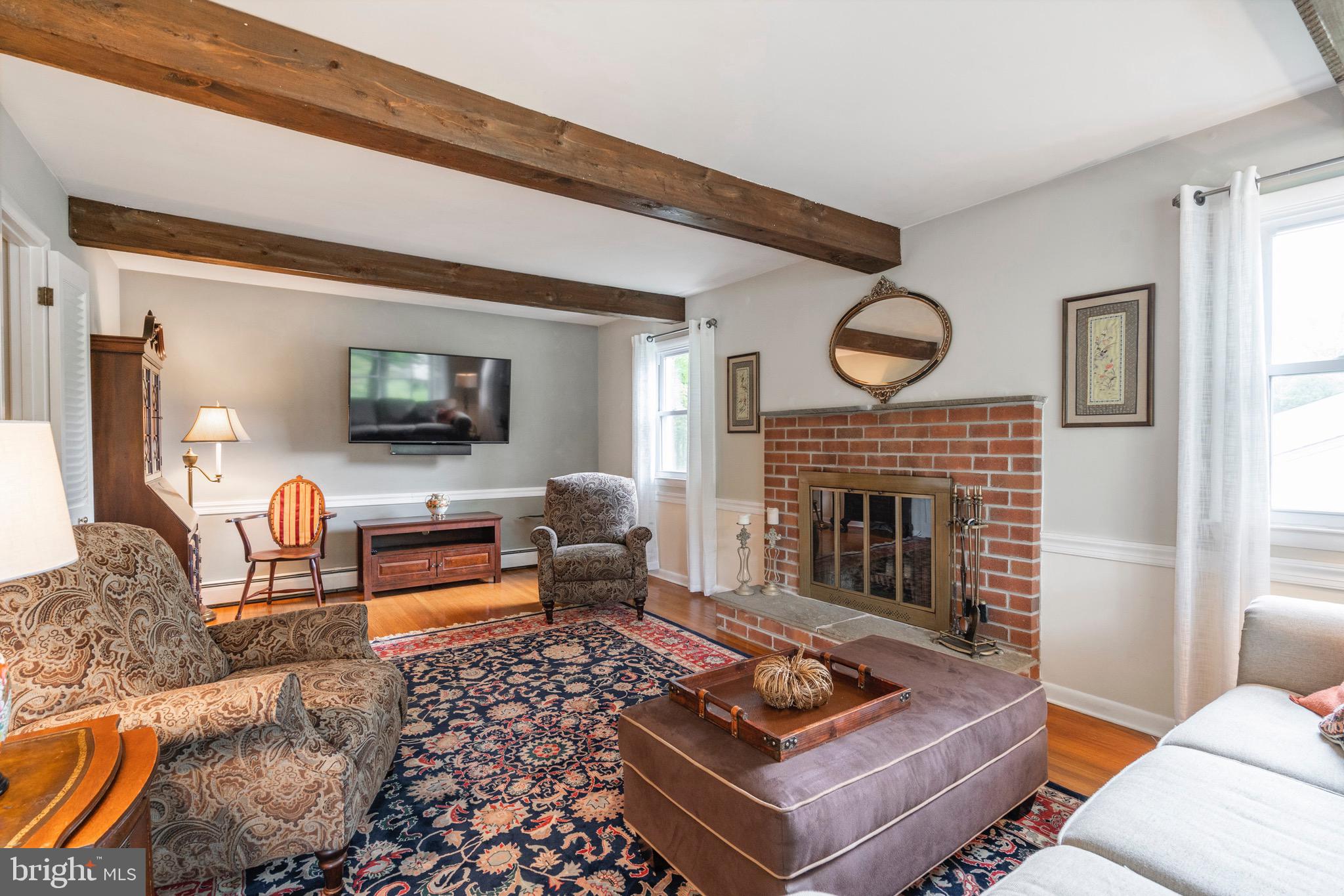 1218 Eagle Road West Chester, PA 19382 - Photo 20 of 51 Living Room with hardwood floors, brick FirePlace