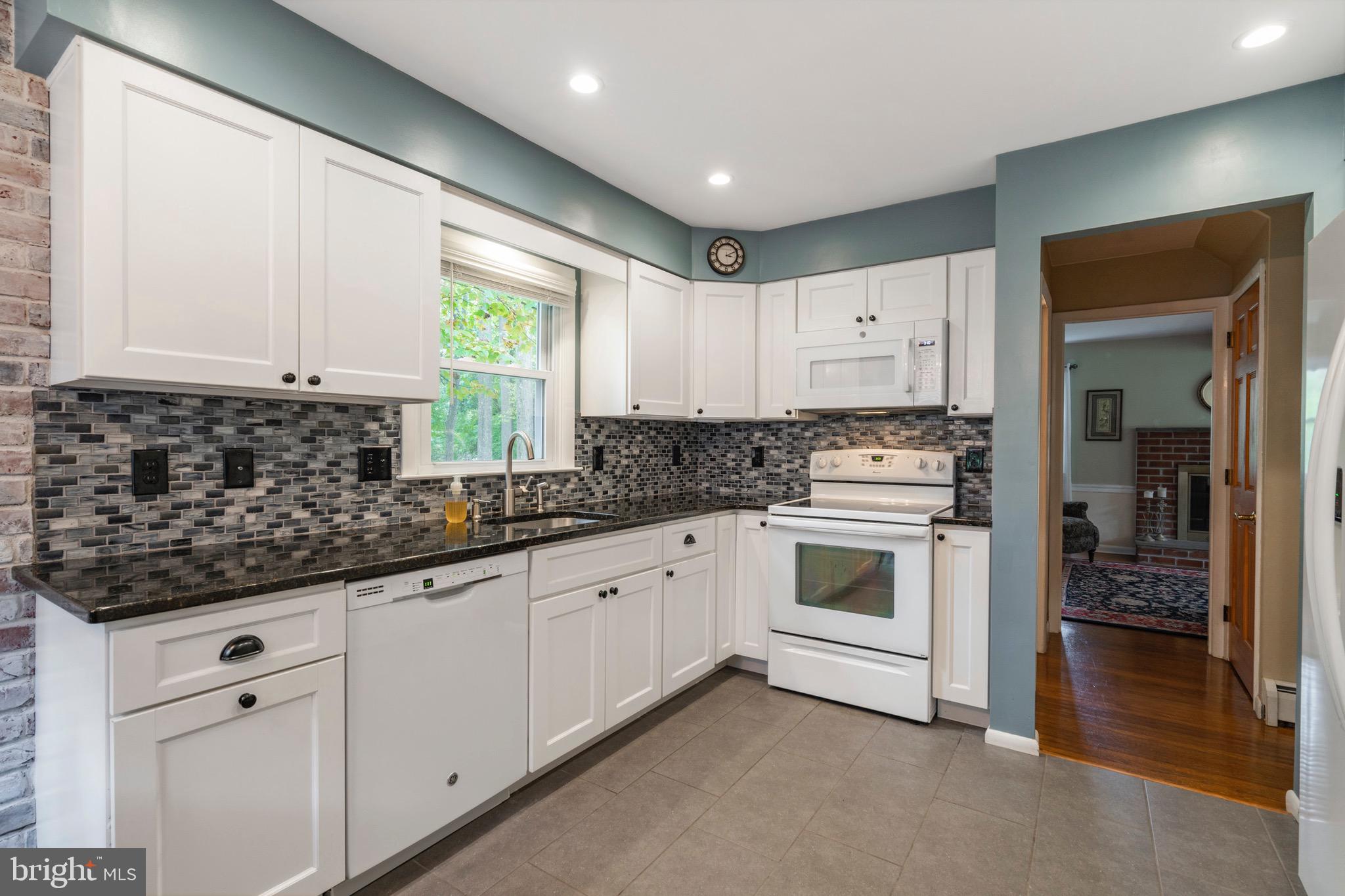 1218 Eagle Road West Chester, PA 19382 - Photo 29 of 51 Under cabinet Micro wave oven and newer Stove