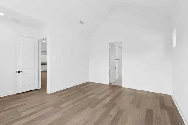 a view of a yard with trees