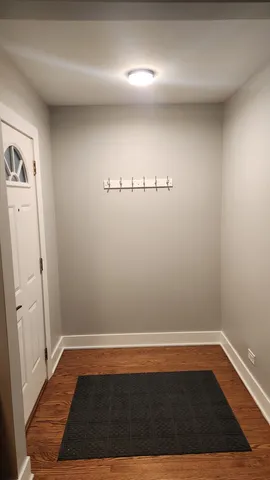 a view of room with hardwood floor