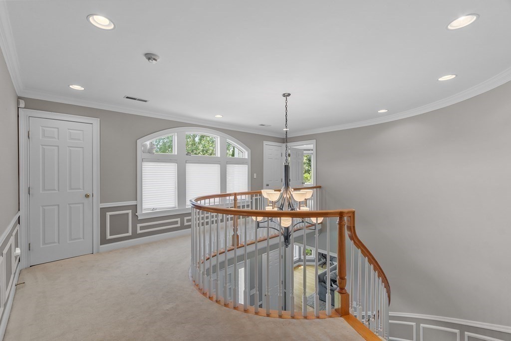 84 Monument Farm Road Concord, MA 01742 - Photo 16 of 34 a view of an entryway door and hallway