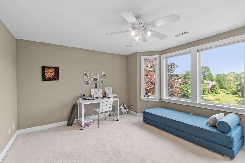 84 Monument Farm Road Concord, MA 01742 - Photo 23 of 34 a living room with furniture and a large window