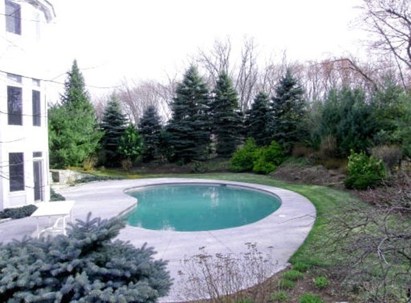 84 Monument Farm Road Concord, MA 01742 - Photo 27 of 34 a view of swimming pool with a yard
