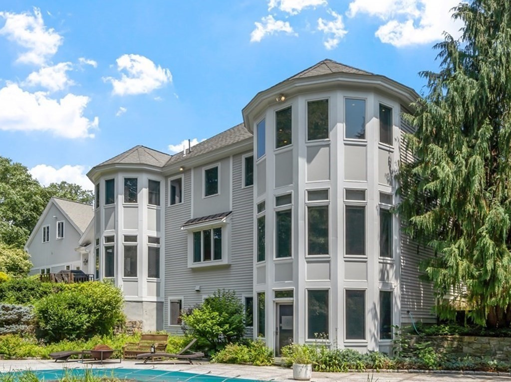 84 Monument Farm Road Concord, MA 01742 - Photo 28 of 34 a front view of a multi story residential apartment building