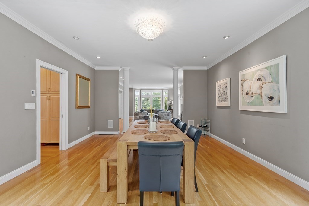 84 Monument Farm Road Concord, MA 01742 - Photo 6 of 34 a view of a dining room with furniture and wooden floor