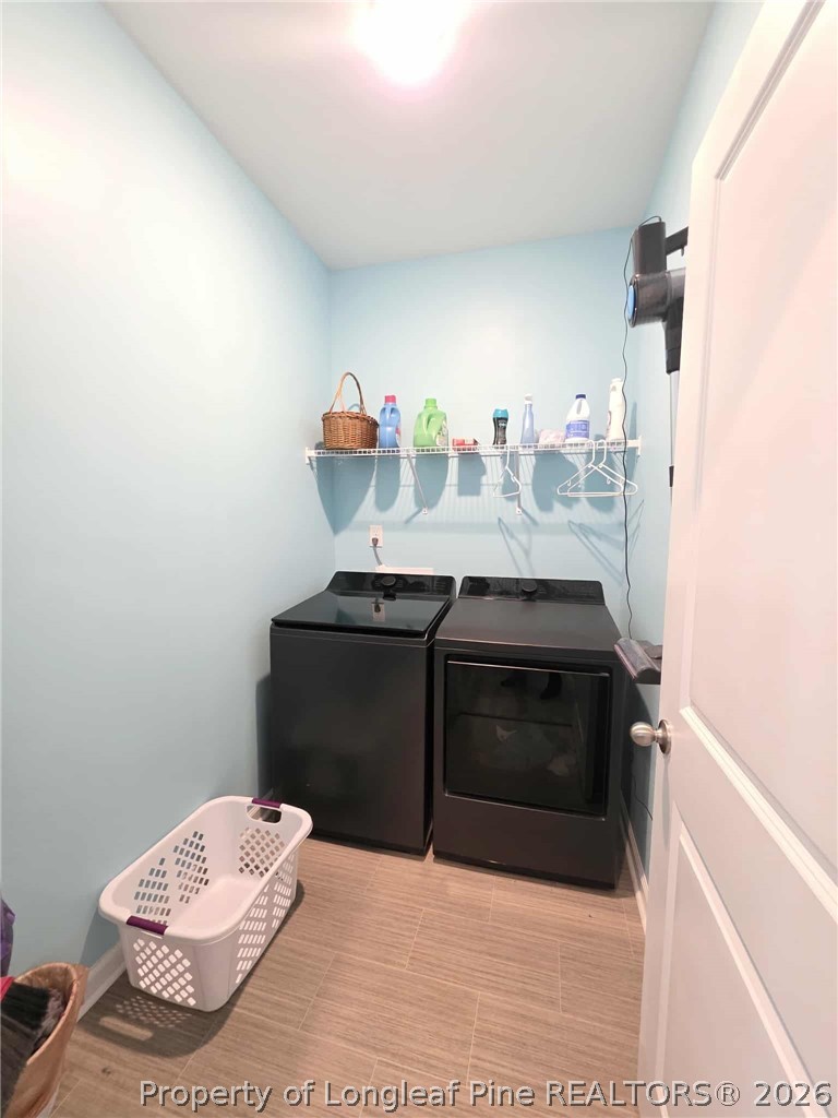 317 Laurel Lake Road Salemburg, NC 28385 - Photo 13 of 29 a bathroom with a sink and a mirror