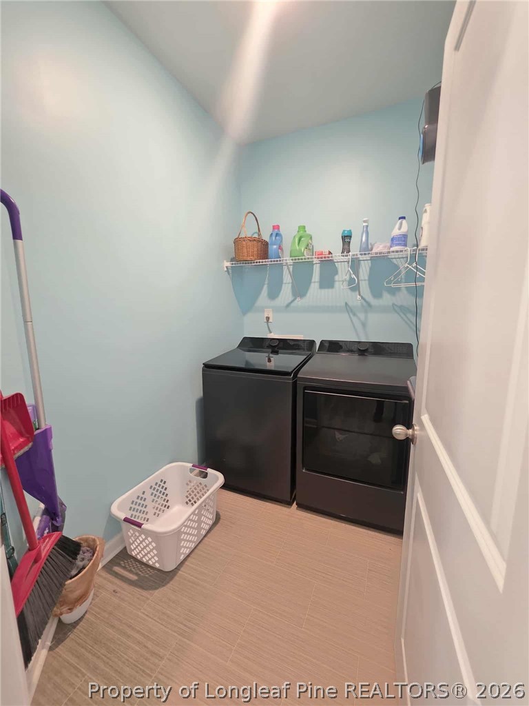 317 Laurel Lake Road Salemburg, NC 28385 - Photo 27 of 29 a bathroom with a sink toilet and vanity