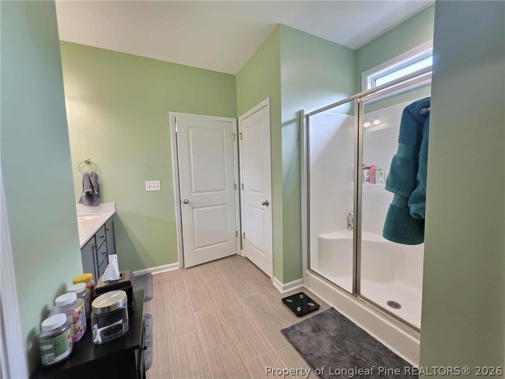 317 Laurel Lake Road Salemburg, NC 28385 - Photo 8 of 29 a room with a door open to a room