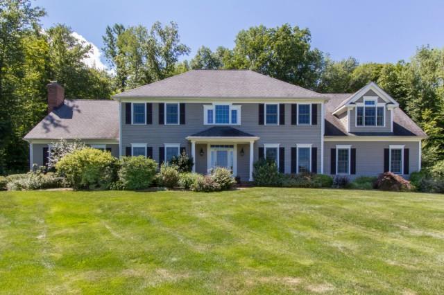 9 Winter Ridge Road Newtown, CT 06482 - Photo 1 of 1 a front view of a house with garden