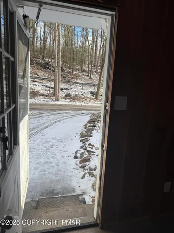 a view of a glass door of a house