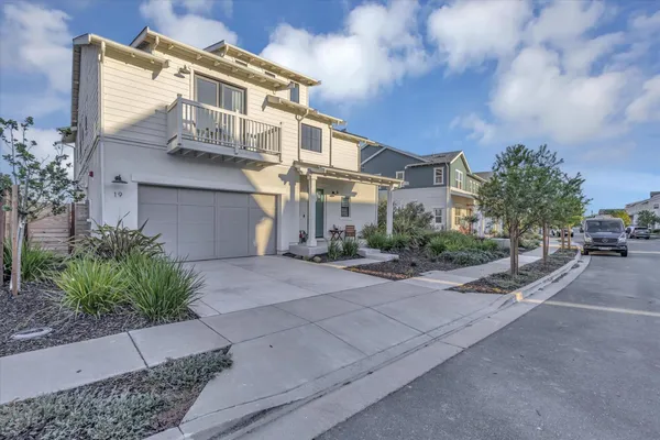 a view of a street with a building in the background