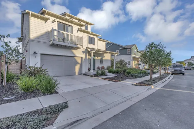 a view of a street with a building in the background