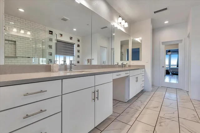 a living room with furniture or couch and a dining table with wooden floor