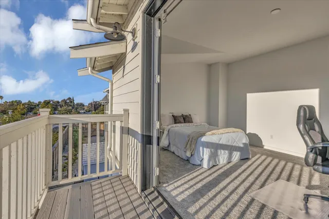 a outdoor space with lots of furniture and clutter
