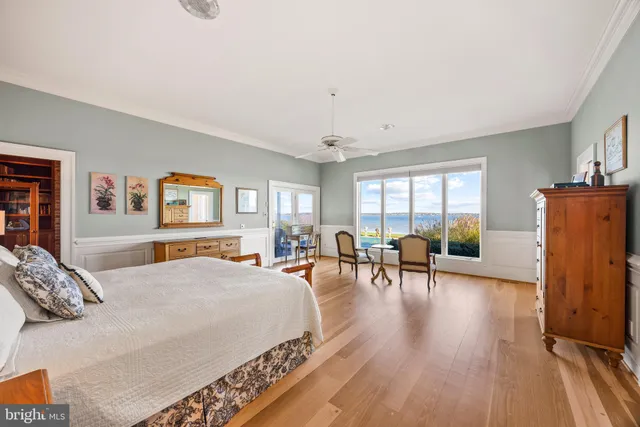 a view of a room with a table and chairs