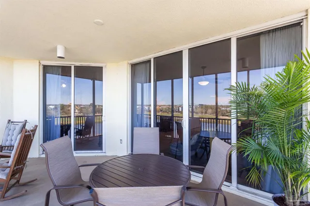 a outdoor space with lots of furniture and outdoor view