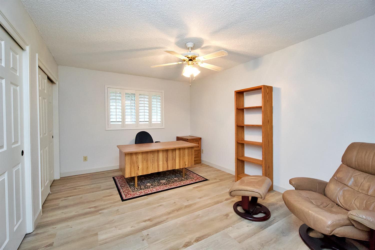 1004 Joy Street Madera, CA 93637 - Photo 17 of 29 a living room with furniture and a window