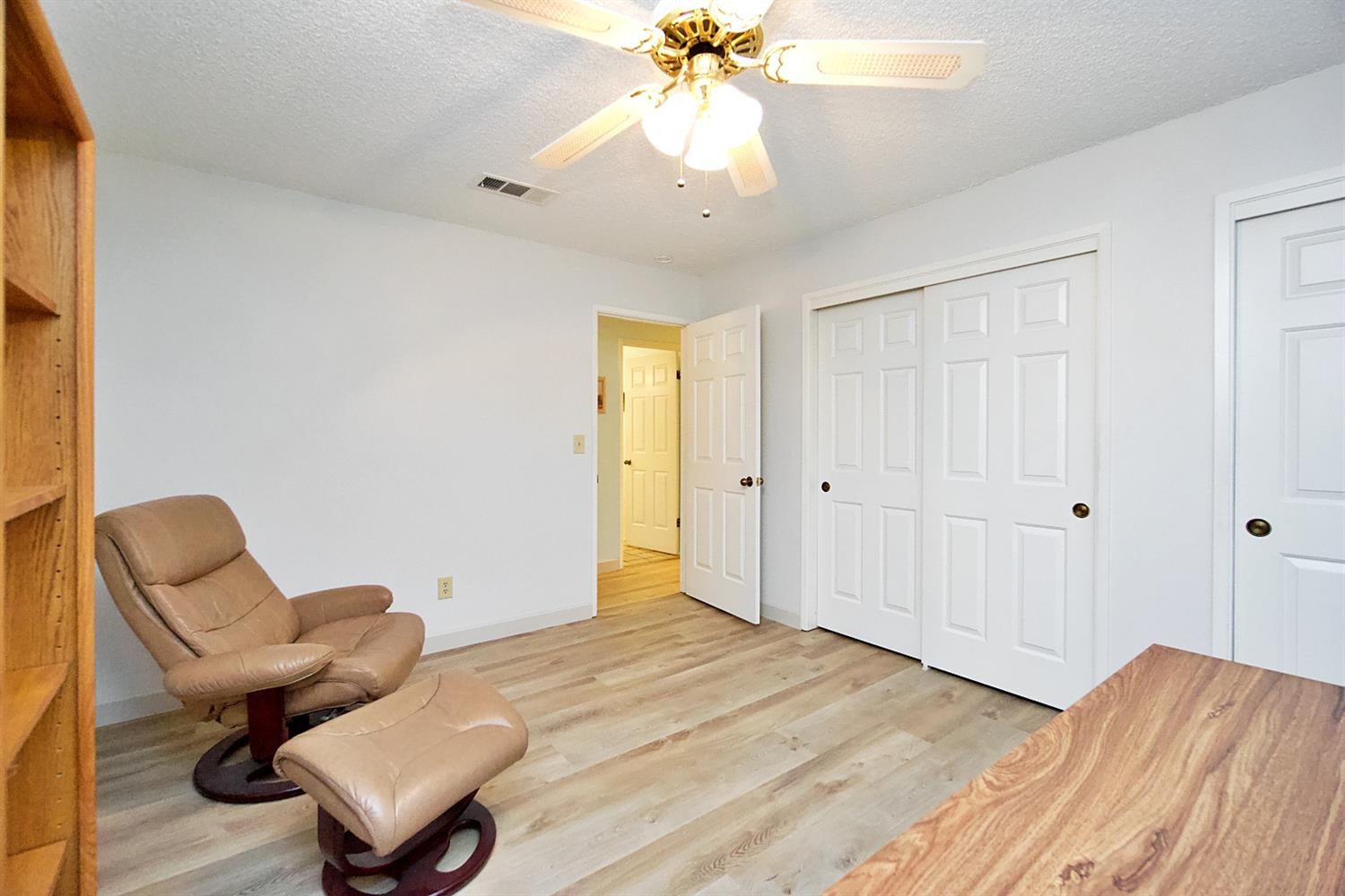 1004 Joy Street Madera, CA 93637 - Photo 18 of 29 a bedroom with bed and window