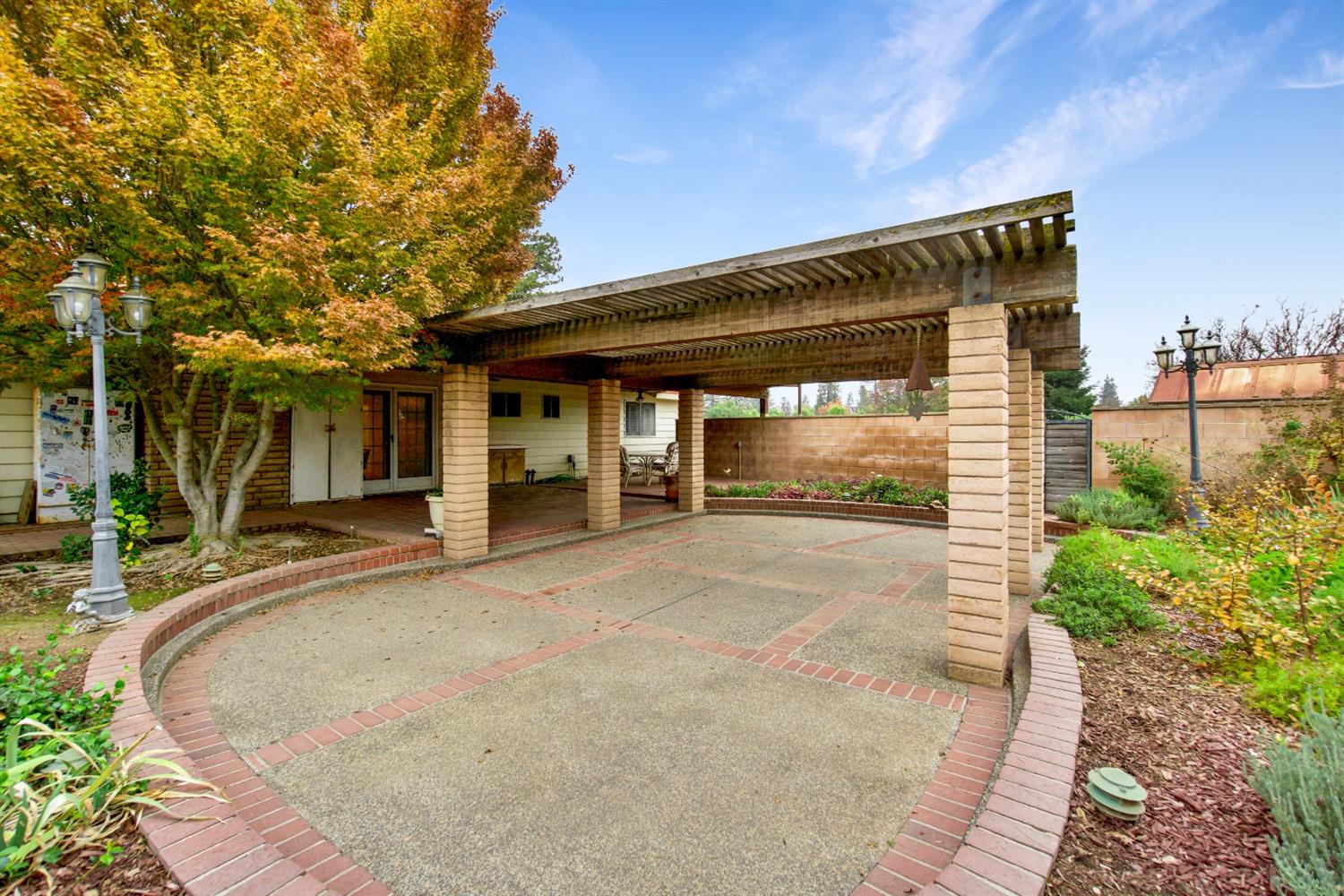 1004 Joy Street Madera, CA 93637 - Photo 26 of 29 front view of a house with a garden